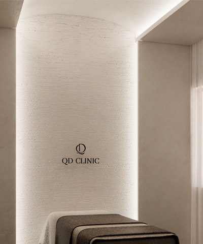 A treatment room at QD Clinic, the clinic mark on the wall