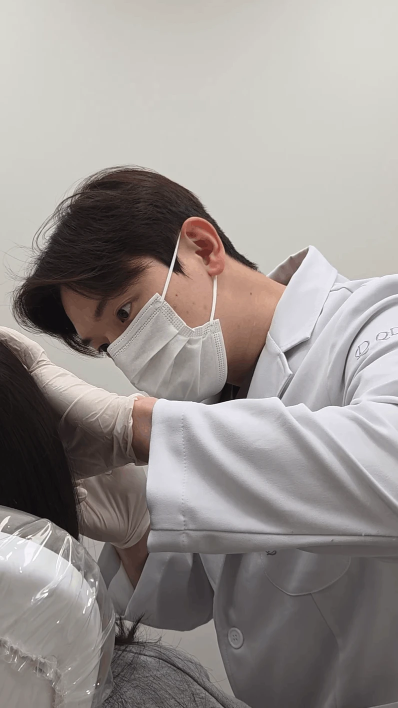 Dr. Junhyun Kim seeing a patient at QD Clinic — photo 1