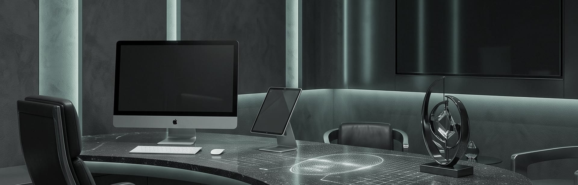 The QD AI consulting desk, a monitor and a wall screen in a darkened room